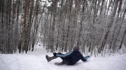 Kid on the snow hill Stock Footage 72102613