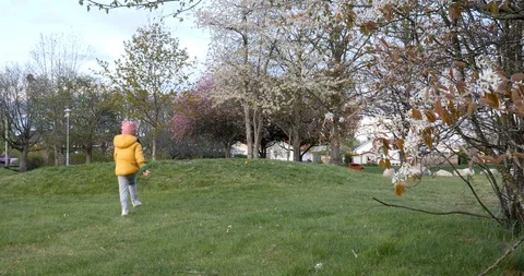 Kid spring in the park Stock Footage 129732193
