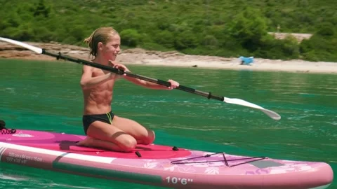 Kid on stand up paddle board. Stock Footage 203483343