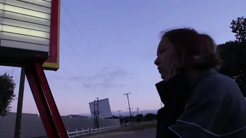 Kid standing outside drive in wondering what to do Stock Footage 150394366