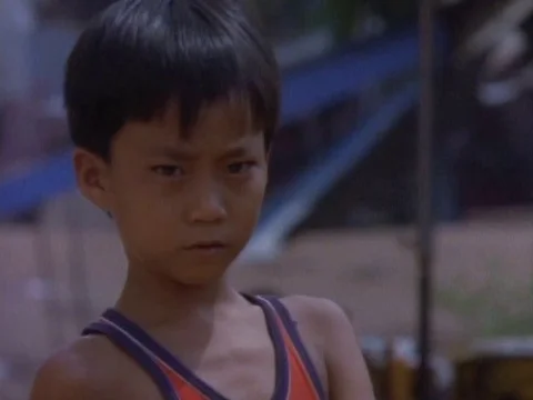Kid staring at the camera and making faces Stock Footage 79880467