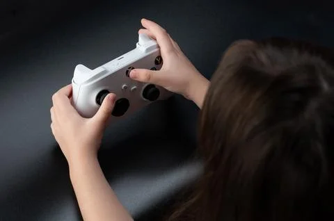 Kid start xbox x game console Stock Photos