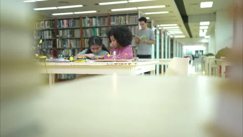 A kid students in a robotics project during a STEM class Video stock 320787287