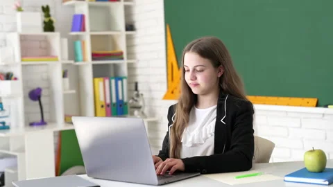 Kid study online with laptop in classroom, back to school Stock Footage 212334193