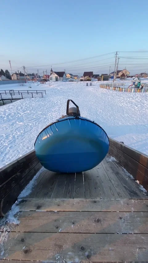 Kid Stumbles Off The Sledding Ramp, Perm, Russia - 08 Mar 2024 스톡 동영상 325396354