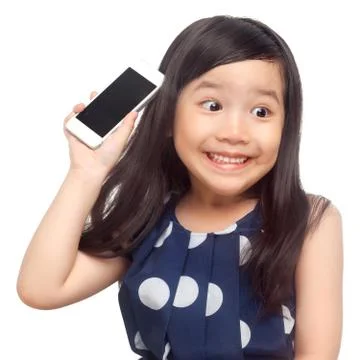 Kid surprised with smartphone Stock Photos