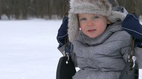 Kid swaying on swing Stock Footage 104086573
