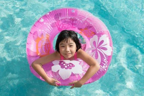 Kid in swimming pool Stock Photos