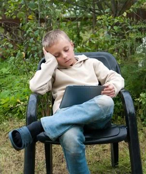 Kid with tablet pc. Stock Photos