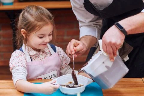 Kid taking part in baking workshop Stock Photos