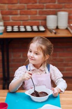 Kid taking part in baking workshop Stock Photos