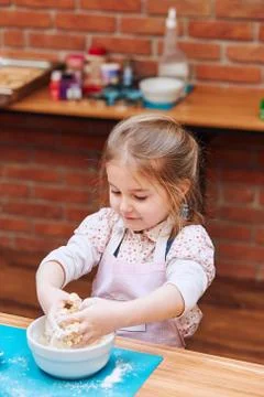 Kid taking part in baking workshop Stock Photos