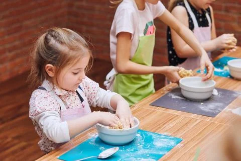 Kid taking part in baking workshop Stock Photos