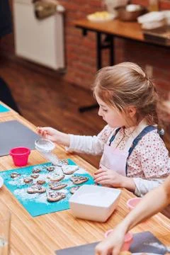 Kid taking part in baking workshop Stock Photos