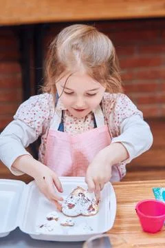Kid taking part in baking workshop Stock Photos