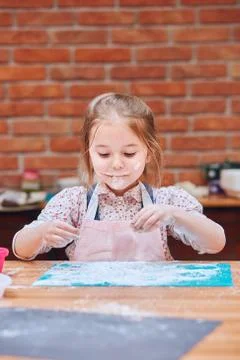 Kid taking part in baking workshop Stock Photos