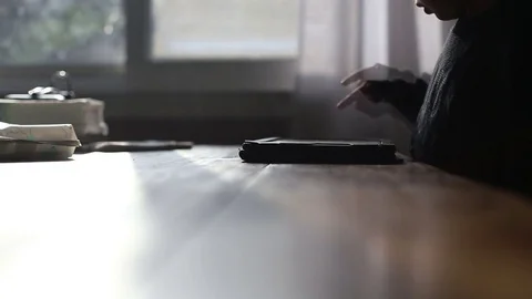 Kid tapping option on electronic tablet, video Video stock 79563031