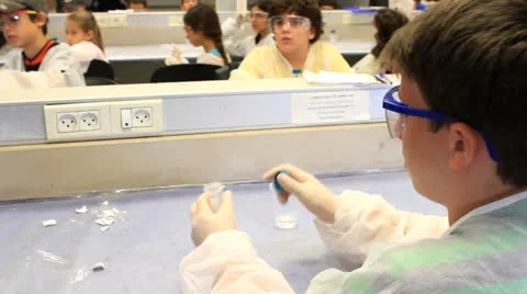Kid with test tube Stock-Footage 25594288
