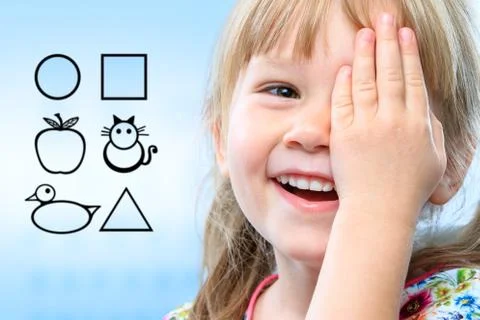 Kid testing vision with symbols. Stock Photos