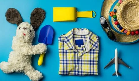 Kid travel objects concept on blue background 写真素材