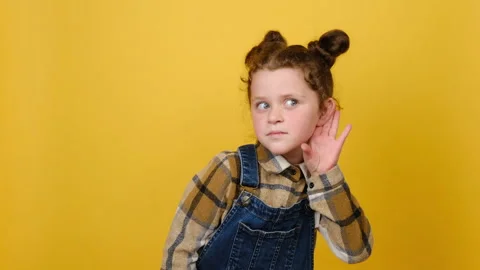 Kid try to hear you overhear listen intently clapping hands showing thumb up Stock Footage 162665587