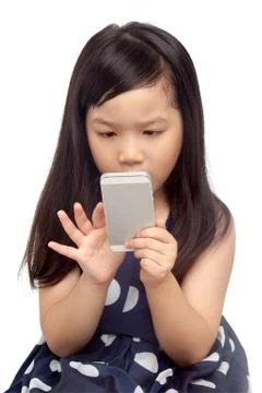 Kid using smartphone Stock Photos