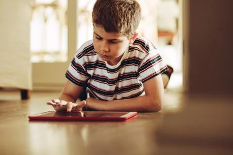 Kid using technology for learning Stock Photos