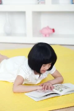 Kid. Vertical composition Oriental Focus. Oriental figures Indoor Asians girl Stock Photos