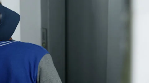 Kid waiting for an elevator 스톡 동영상 34649252