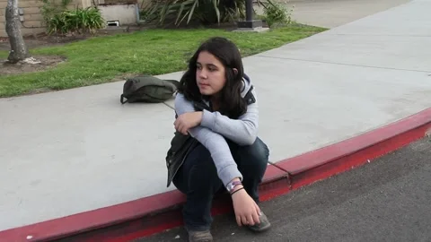 Kid waits in fire zone at school Stock Footage 155387244