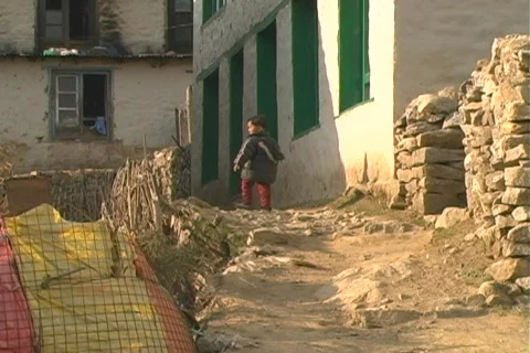 Kid walks in Namche Bazaar Stock Footage 133657