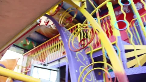 Kid walks up stairs of a ride Stock Footage 154992475