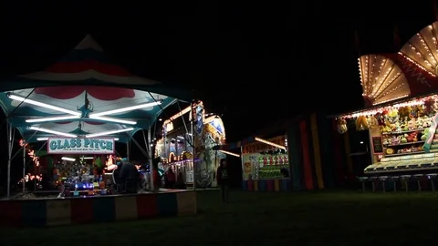 Kid walks through carnival Stock Footage 80074895