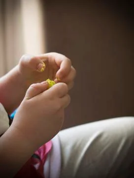 A Kid Working with Plasticine Stock Photos