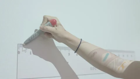 Kid is writing on interactive board Stock Footage 134230194