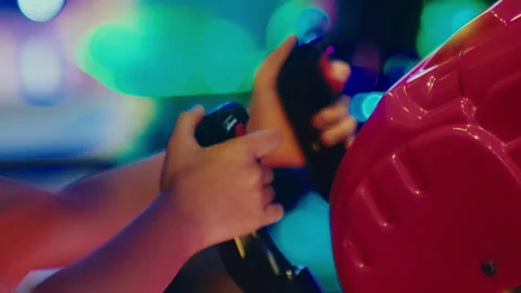 Kid young child play video games in arcade game room machine close up of Stock Footage 281670893
