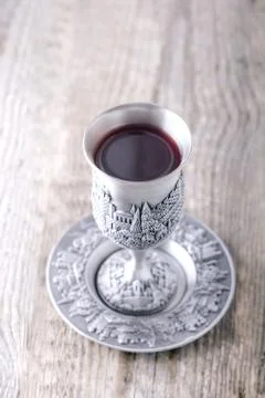 Kiddush cup with wine Foto stock