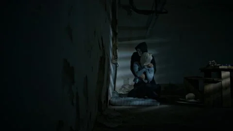 Kidnapper Dragging Hostage into Abandoned Basement Stock Footage 293632357