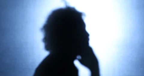 Kidnapper Shadow speaking on phone Vidéo 169554763