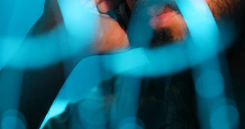 Kidnapper speaking on phone Stock Footage 169567793