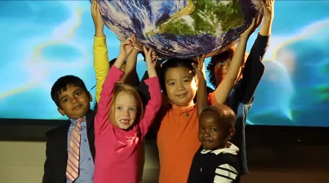 Kids of all races hold up Globe of Planet Earth and throw it upward Stock Footage