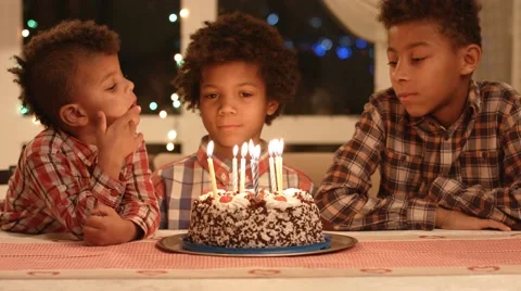 Kids and cake with candles. Stock Footage
