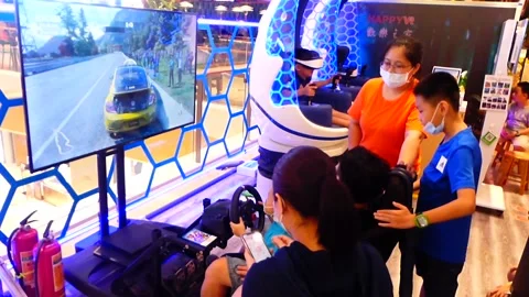The kids are having fun playing with virtual reality Stock Footage 136424877