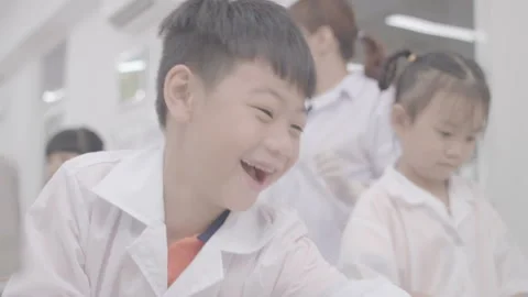 Kids are learning science at laboratory Stock Footage 134225539