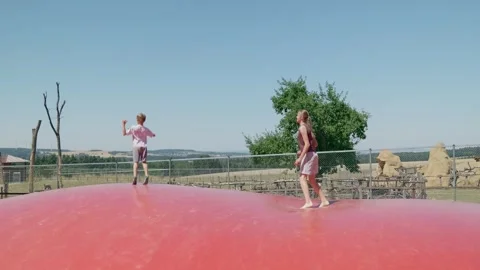 Kids Are Playing on the Trampoline 스톡 동영상 344864910