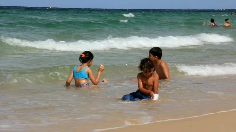 Kids on the beach Stock Footage
