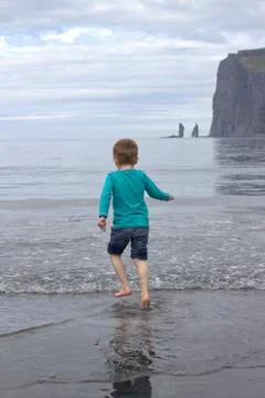 Kids on a beach Stock Photos