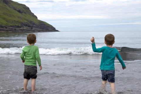 Kids on a beach Stock Photos