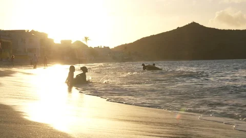 Kids on the beach - sunset Stock Footage 128417823