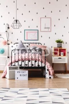 Kid's bedroom with creative wallpaper Stock Photos
